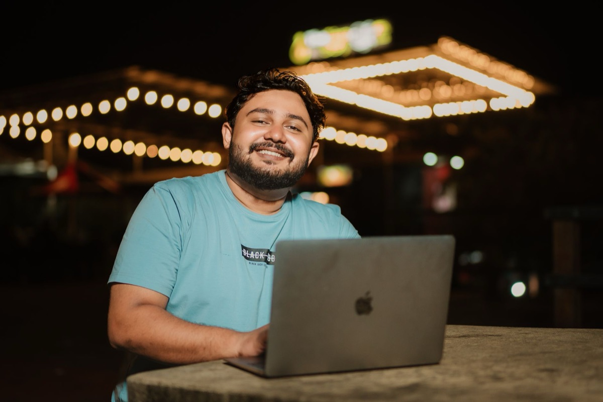 australian you-tuber with laptop